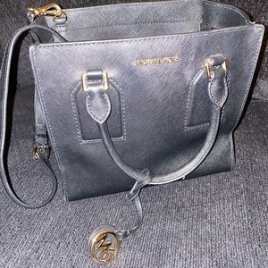 Black Michael Kors box purse.